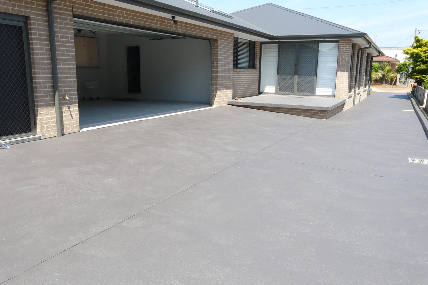 Driveway and garage — new home in Umina Beach by D M Hayes Builder